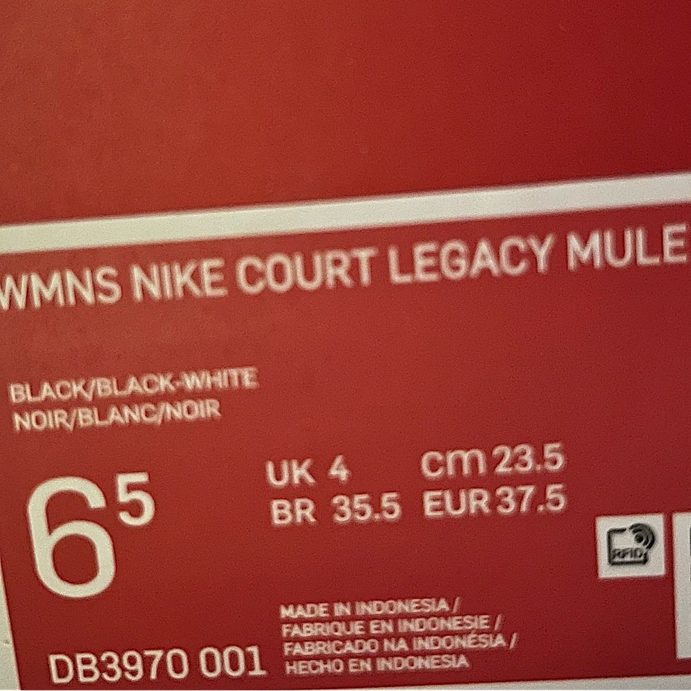 Selling woman’s black and white Nike court legacy mule shoes size 6.5 US